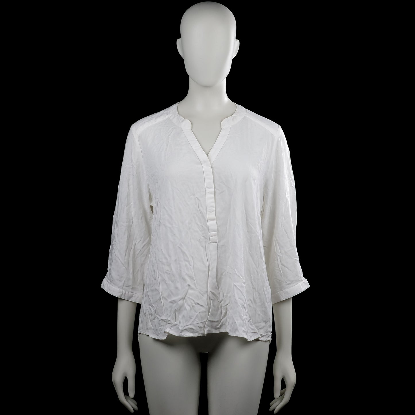 Jyothi - Blouse - White - Size M - White solid top with a V-neck and partial front placket. Features three-quarter sleeves with button cuffs and a curved hem.