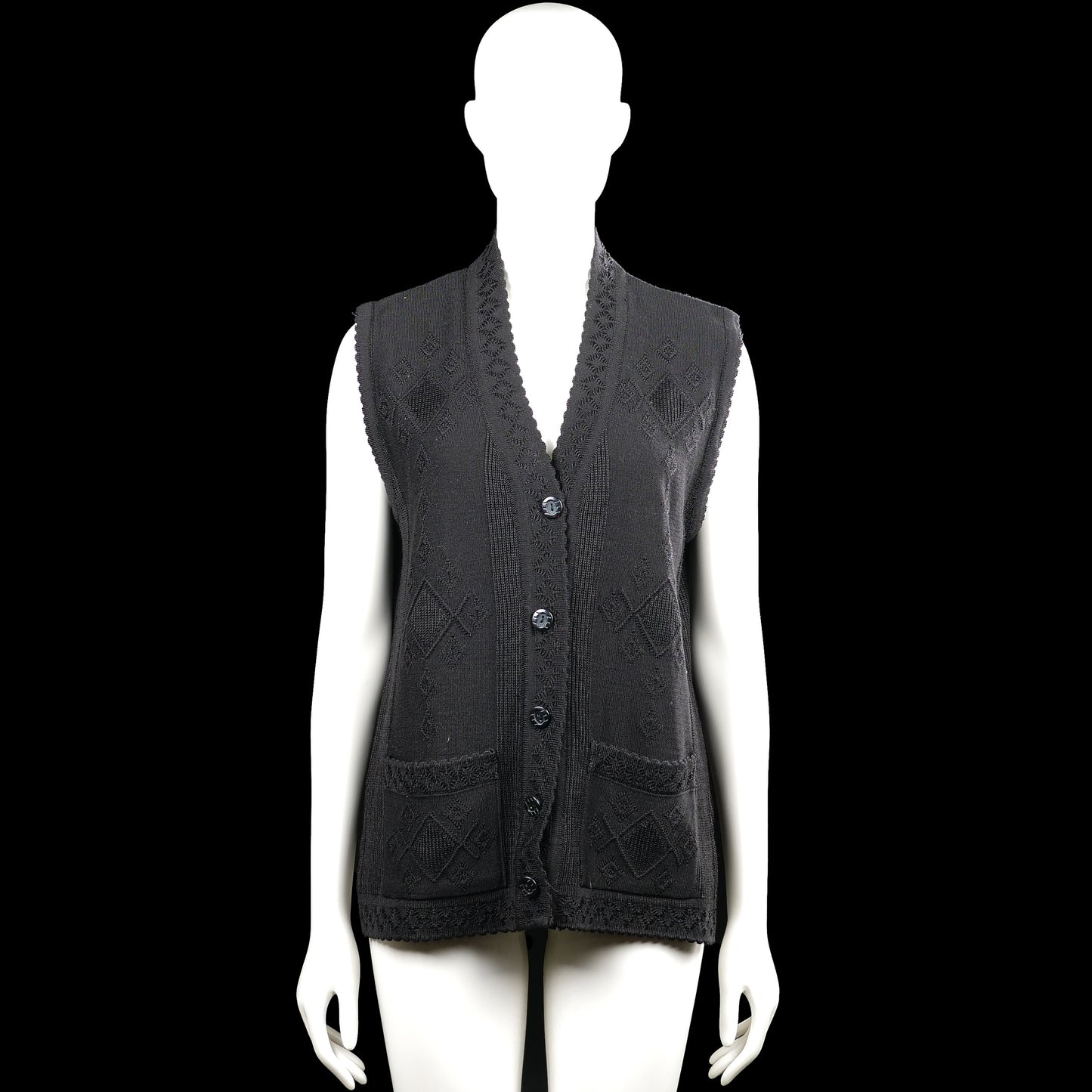 Doga - Suit vest - Black - Size M - Black sleeveless vest with a V-neck and button-front closure. Features a textured diamond pattern, two front patch pockets, and a straight hem.