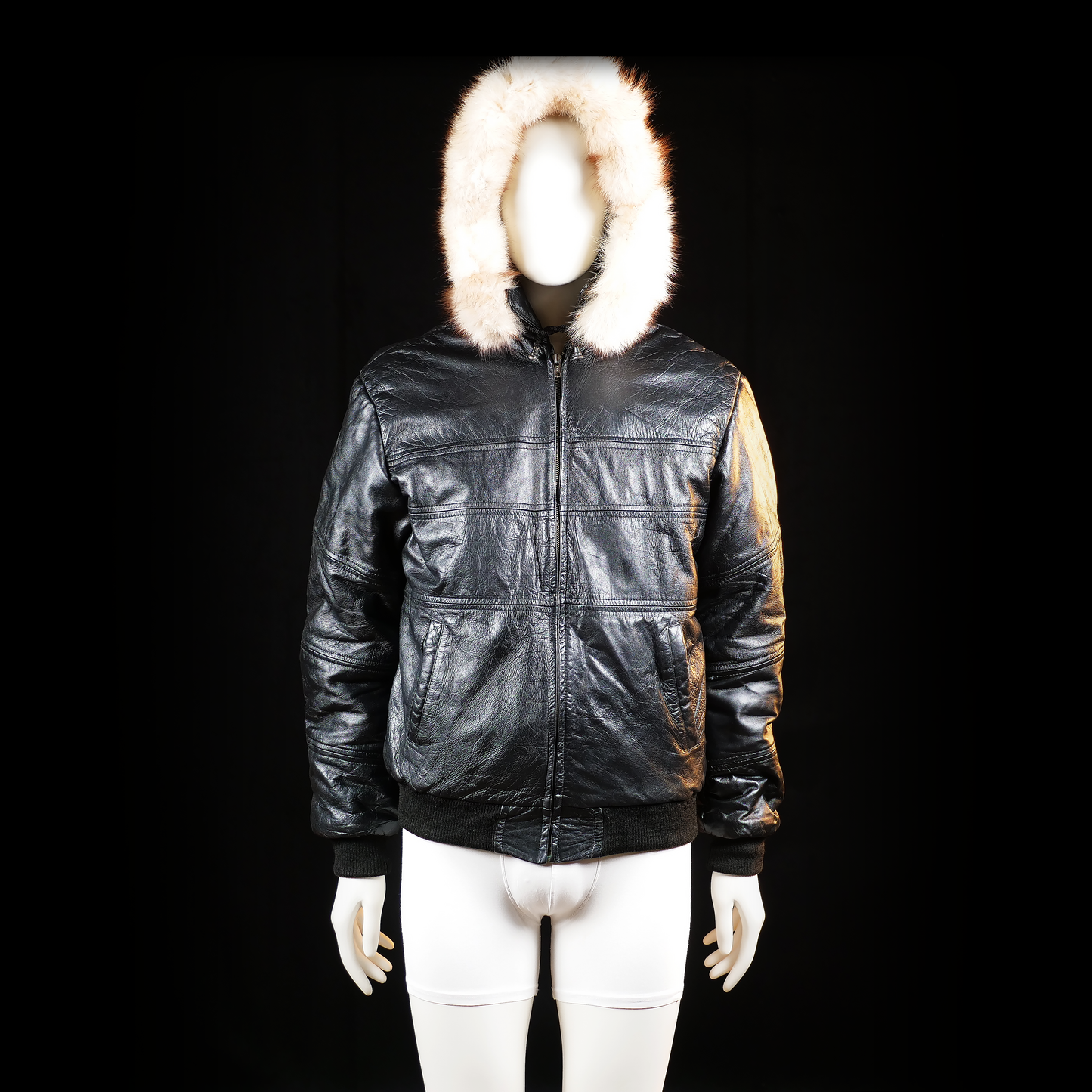 Power - Leather jacket - Black & Ivory - Size M - Black leather jacket with a waist-length cut, ribbed cuffs and waistband, and a front zipper closure. Attached hood is trimmed with ivory faux fur, adding a standout feature.