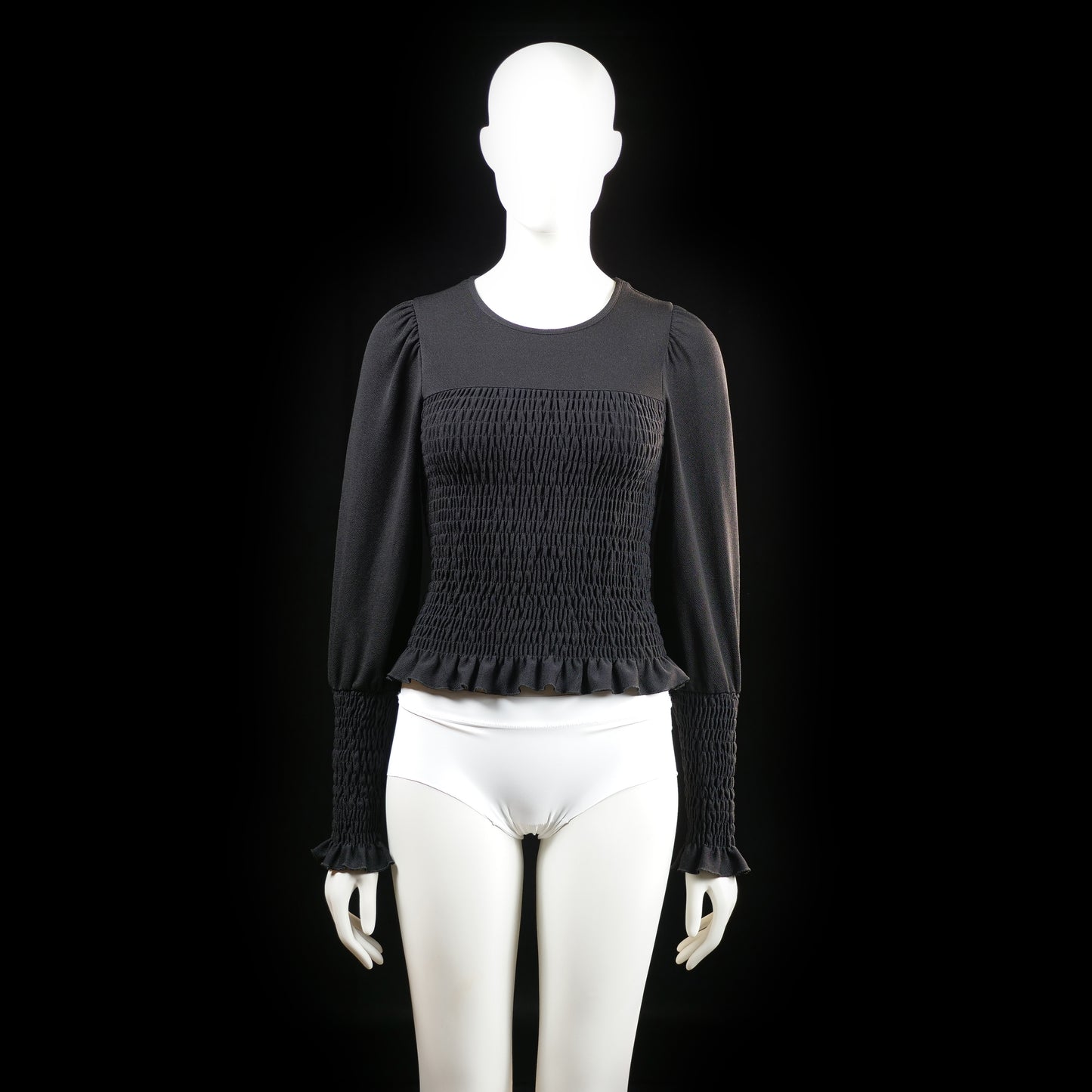 Gina Tricot - Blouse - Black - Size S - Long-sleeve top with a fully shirred bodice and sleeve cuffs, featuring a ruffled hem and sleeve ends. Rounded neckline with lightly puffed shoulders.