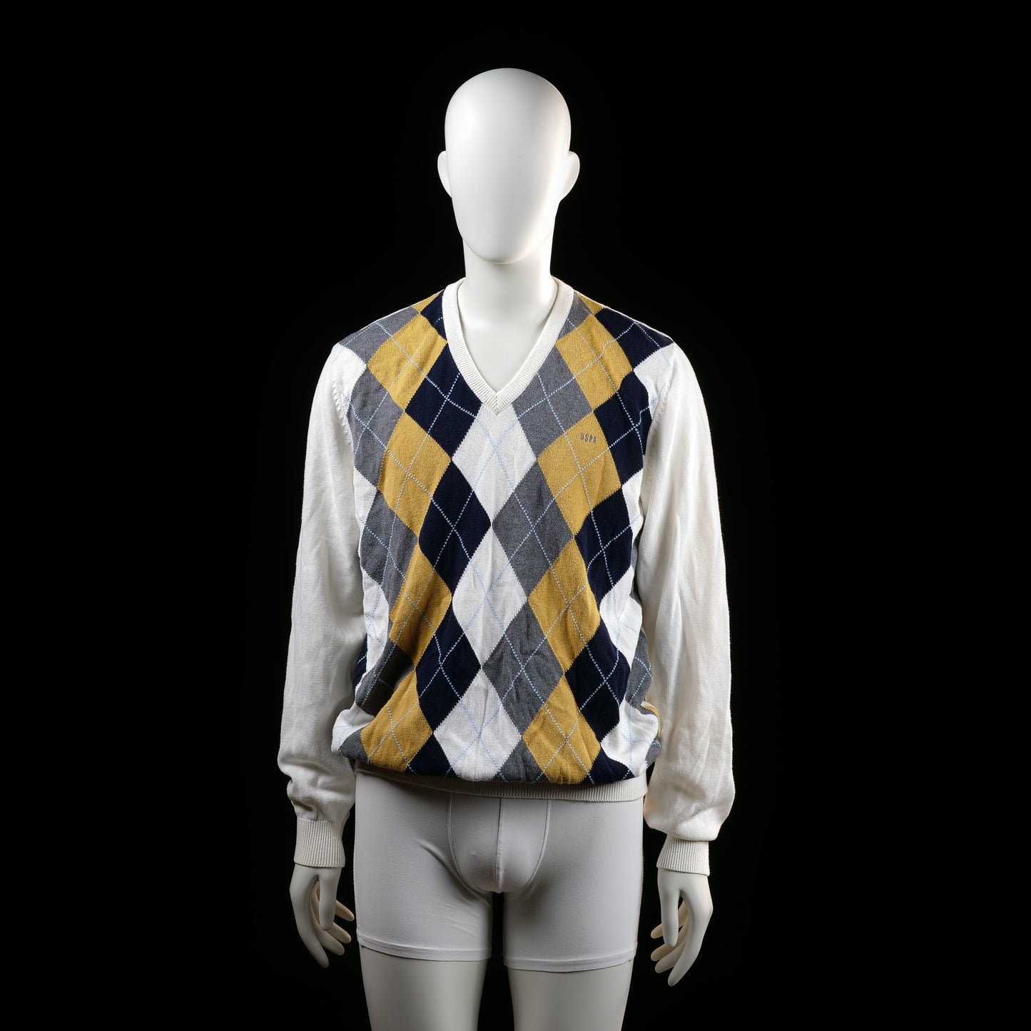 U.S. Polo Assn - Sweater - Multicolored - Size L - Long-sleeve sweater with a ribbed V-neckline and cuffs. The front features a bold argyle pattern in navy, mustard yellow, white, and gray, while the back and sleeves are solid white.