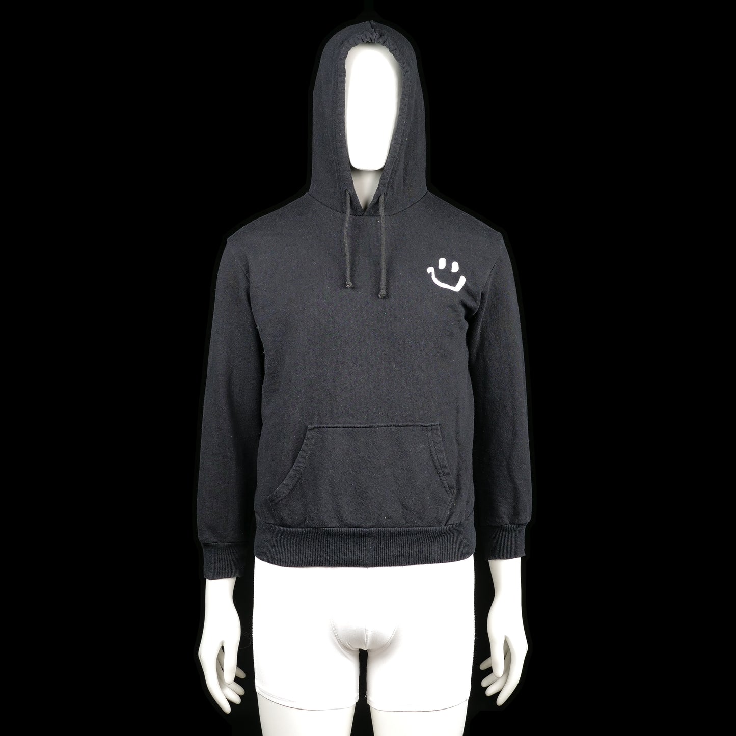 Hoodie - Black & White - Size S - Black hoodie with ribbed cuffs and hem, featuring a white smiley print on the left chest. Includes a front kangaroo pocket and drawstring at the hood.