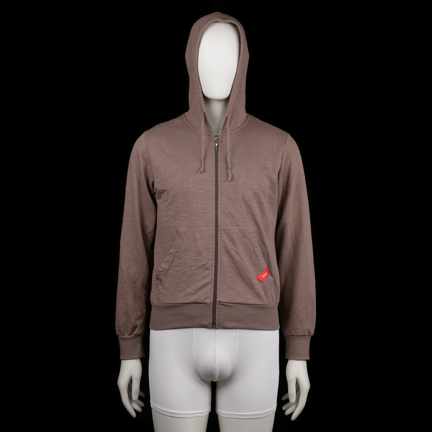 Dunder Sportswear - Hoodie - Brown - Size 42 - Brown zip-up hoodie with front kangaroo pockets and a drawstring-adjustable hood. Features ribbed cuffs and hem with a small red tag detail on the pocket.