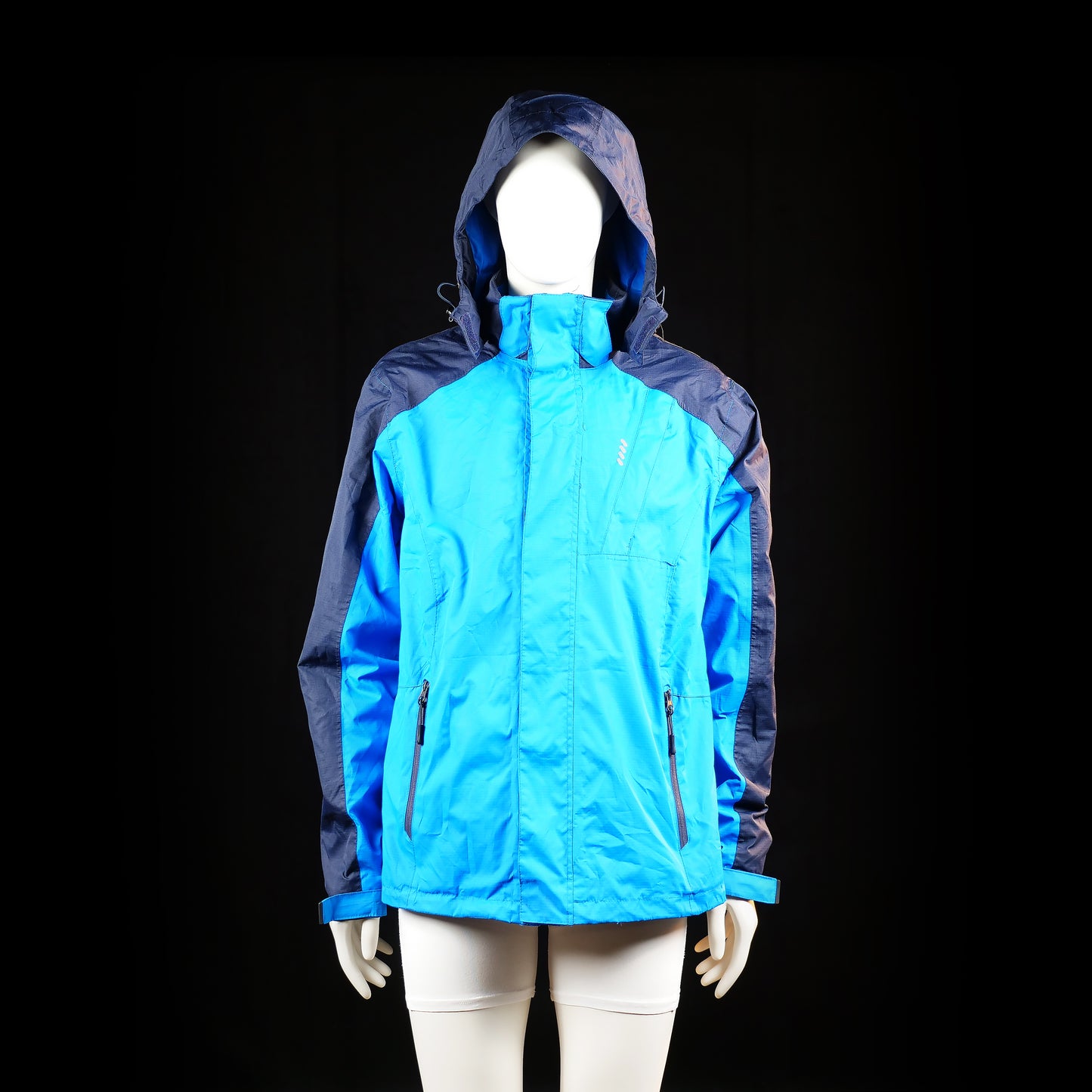 Crivit - Rain jacket - Sky Blue & Navy - Size 56 - Two-tone zip-up hooded jacket with a high collar and adjustable drawcord hood. Features zippered side pockets and a chest seam detail.