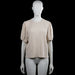 .Object - T-shirt - Beige - Size L - Beige ribbed top with a round neckline and short puff sleeves with elastic cuffs. Straight hem with no visible closures.
