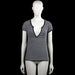 Bijenkorf - T-shirt - Black & Gray - Size M - Black and gray striped top with a deep V-neckline and short sleeves. Features plain sleeve cuffs and a straight hem.