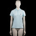 Flash - T-shirt - Light Blue - Size M - Light blue solid polo shirt with a polo collar and a short front zipper. Short sleeves with plain cuffs and a straight hem.