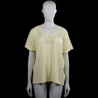 Florie - T-shirt - Yellow - Size XXL - Yellow solid short-sleeve top with a scoop neckline and a short button placket at the center front. Features floral embroidery at the upper chest and plain cuffs with a straight hem.