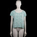 Casual clothing - T-shirt - Mint & White - Size XL - Mint top with an allover white floral pattern and a scoop neckline. Short sleeves with plain cuffs and a straight hem.