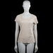 Ambika - T-shirt - Beige - Size M - Beige solid top with a scoop neckline and short sleeves. Straight hem and plain sleeve cuffs with no visible closures.