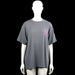 Magnum weight - T-shirt - Gray & Pink - Size L - Gray short-sleeve T-shirt with a round neck and straight hem. Features a small pink heart graphic on the chest and a small pink graphic on the upper back.