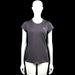 Activefit - T-shirt - Charcoal - Size S - Charcoal solid short-sleeve top with a round neck and plain sleeve cuffs. Straight hem with visible seam detailing and a small chest logo.