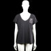 H&m basic - T-shirt - Charcoal - Size XL - Charcoal short-sleeve top with a V-neck and straight hem. Features white graphic print on the chest and a large white text print on the back.