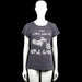 Nikkie - T-shirt - Dark Gray - Size 38 - Dark gray short-sleeve T-shirt with a round neck and straight hem. Features a large white text and motorcycle graphic print on the front and a small white graphic at the upper back.