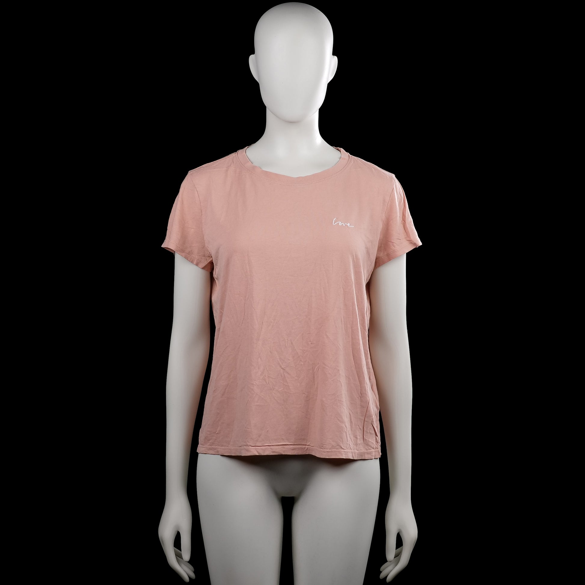 H&M Divided - T-shirt - Pink - Size M - Solid pink T-shirt with a round neck and short sleeves. Straight hem with a small white text detail on the chest.
