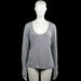 Hema - Long-sleeve top - Gray - Size M - Gray solid long-sleeve top with a V-neckline and plain cuffs. Features a straight hem with no visible closures.