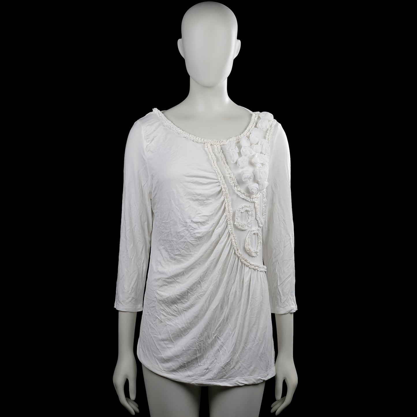 Tesini - Tunic - White - Size 42 - White solid top with a scoop neckline and three-quarter sleeves with plain cuffs. Features ruffled trim and fabric flower appliques on the front and a straight hem.