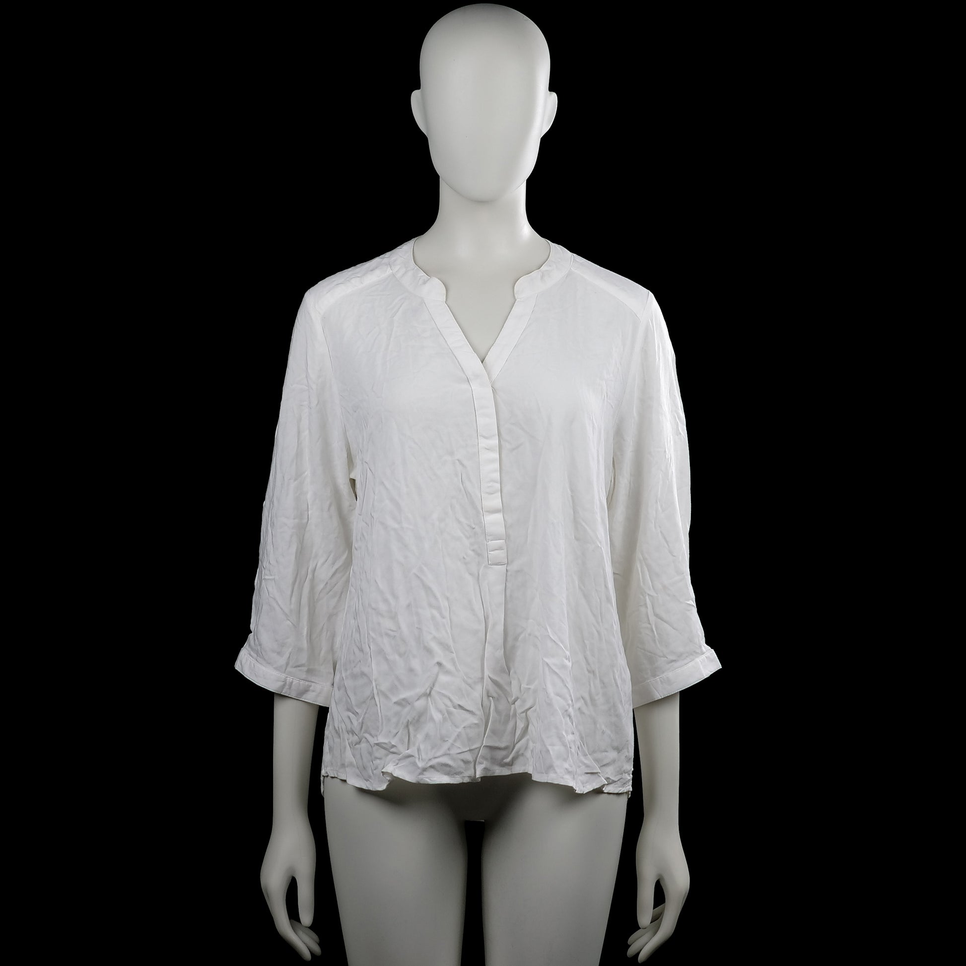Jyothi - Blouse - White - Size M - White solid top with a V-neck and partial front placket. Features three-quarter sleeves with button cuffs and a curved hem.
