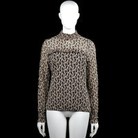 Summum woman - Long-sleeve top - Black & White - Size M - Black and white long-sleeve top with an all-over print and a high smocked neckline. Features a ruffle detail across the chest, ribbed cuffs, a straight hem, and a back keyhole opening with a button closure.