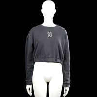 Nikkie - Sweatshirt - Charcoal - Size 32 - Charcoal solid sweatshirt with a round neck and long sleeves. Features a small chest logo and an elastic hem with plain cuffs.