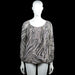 Blouse - Light Gray & Dark Gray - Size M - Light gray and dark gray zebra-pattern blouse with a scoop neckline and long sleeves. Features elastic cuffs and an elastic hem, with lace-trim detail at the center front.