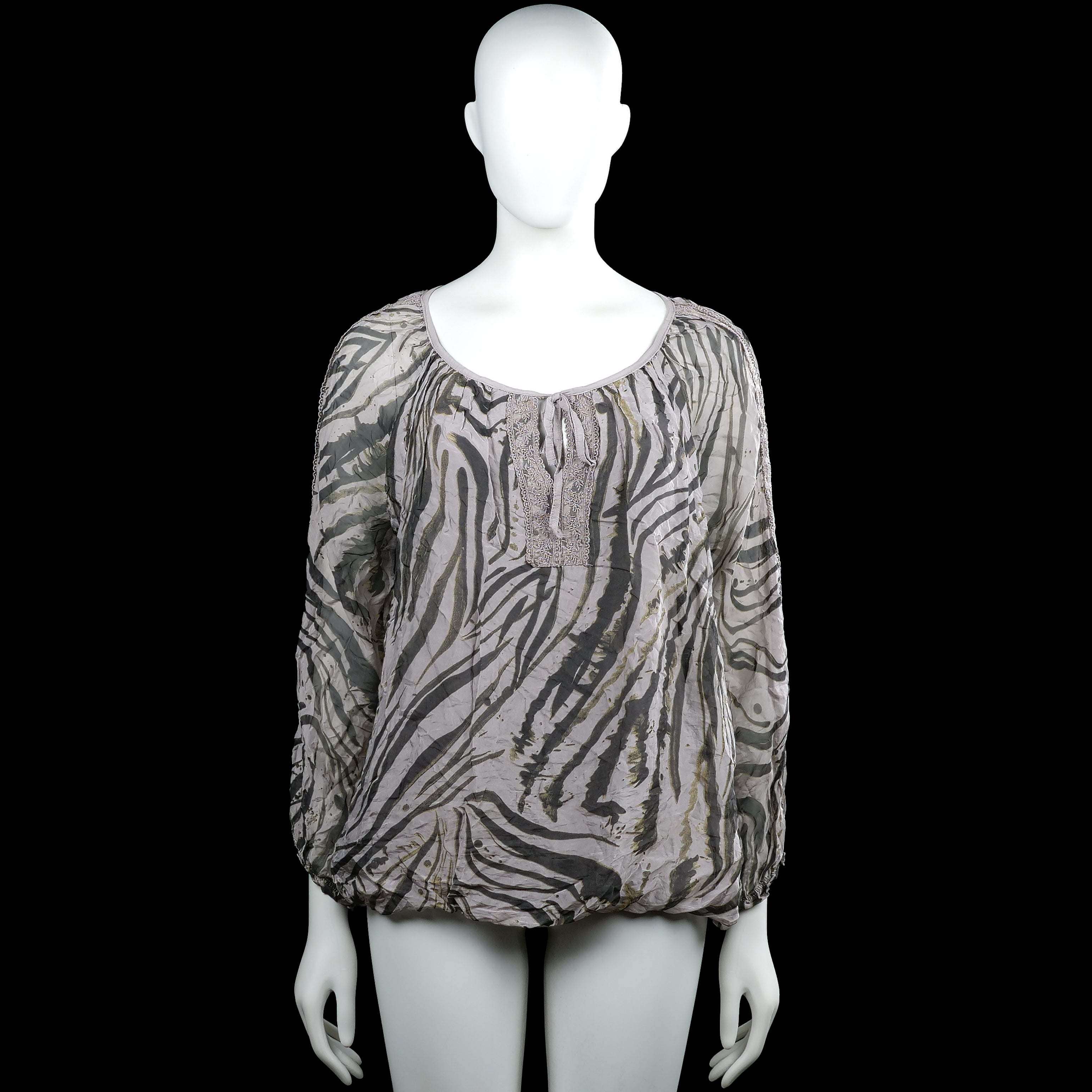 Blouse - Light Gray & Dark Gray - Size M - Light gray and dark gray zebra-pattern blouse with a scoop neckline and long sleeves. Features elastic cuffs and an elastic hem, with lace-trim detail at the center front.