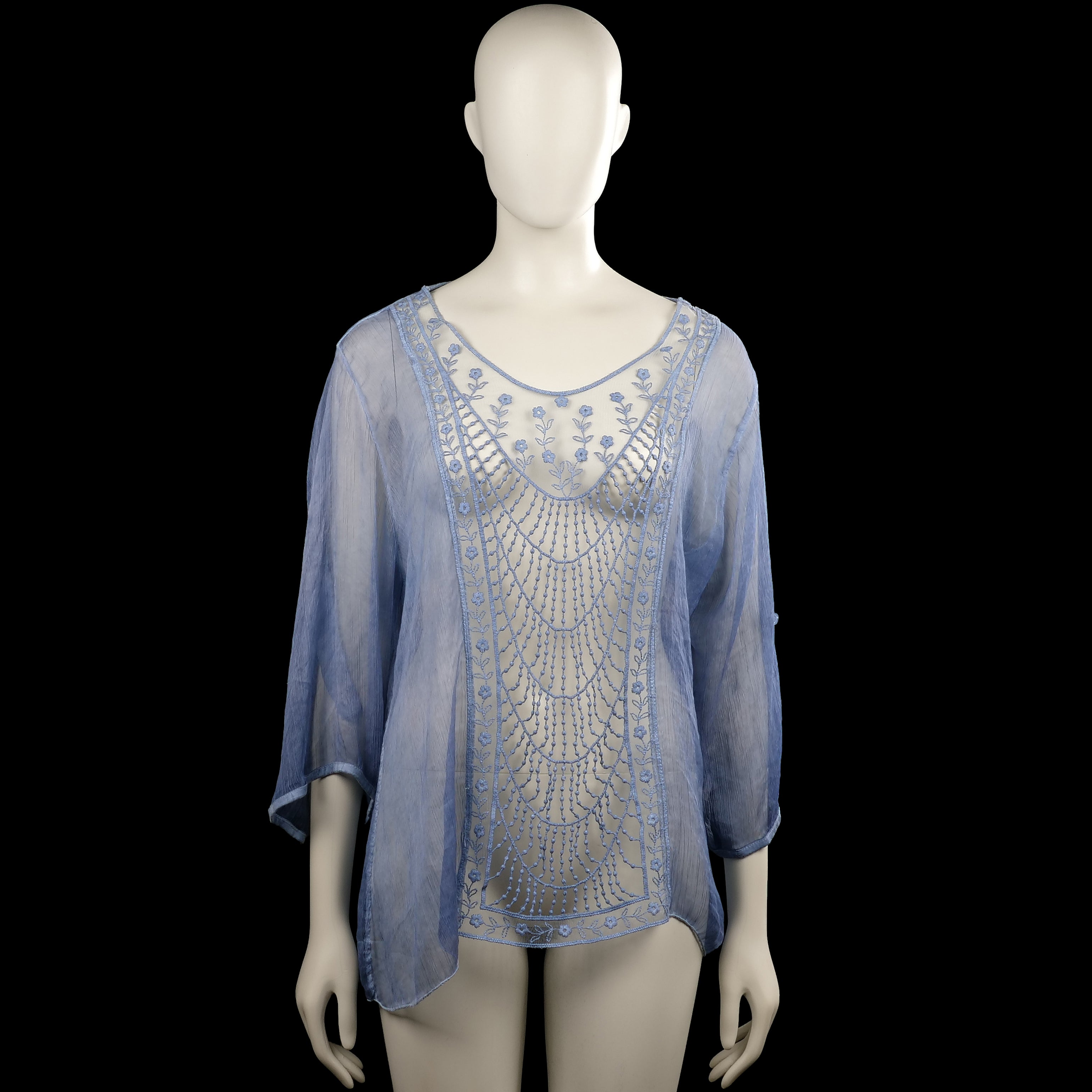 Glitzia - Tunic - Light Blue & White - Size L - Light blue semi-sheer top with a scoop neckline and three-quarter sleeves. Features a curved hem and a white front panel with blue floral embroidery.