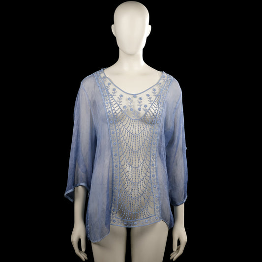 Glitzia - Tunic - Light Blue & White - Size L - Light blue semi-sheer top with a scoop neckline and three-quarter sleeves. Features a curved hem and a white front panel with blue floral embroidery.