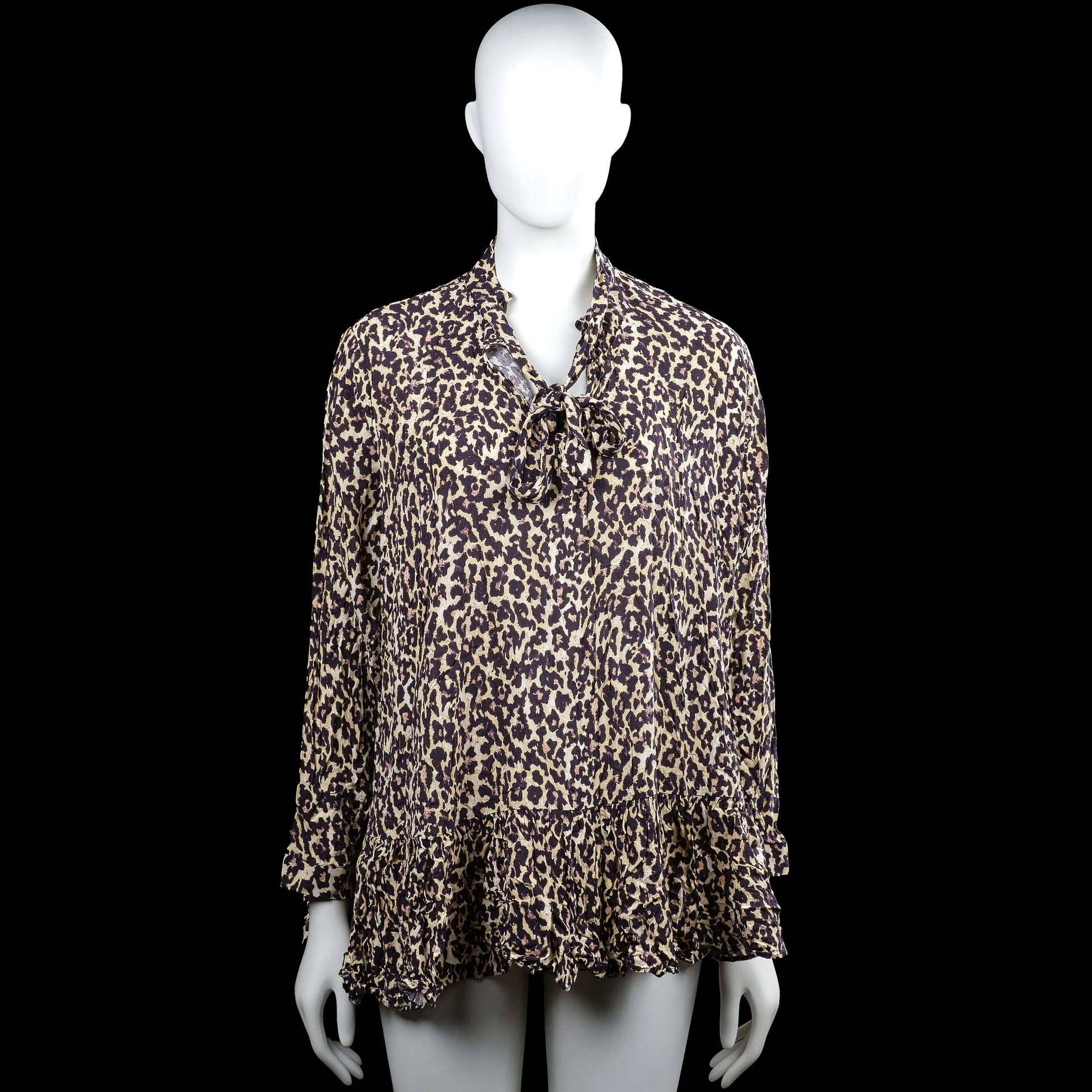 Zara - Tunic - Beige & Black - Size M - Beige and black leopard-pattern blouse with a tie at the V-neckline and long sleeves. Features a ruffled hem and ruffled sleeve ends.