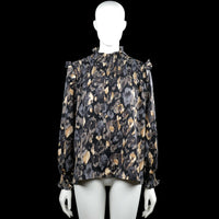Unika - Blouse - Black & Gray - Size M, L - Black and gray floral blouse with a smocked high ruffle neck and ruffle shoulder details. Long sleeves with elastic smocked cuffs and a straight hem.