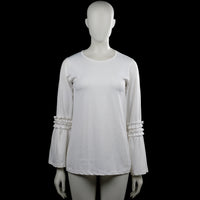 Tunic - White - Size M - White solid top with a round neckline and long sleeves featuring ruffle bands near the cuffs. Straight hem with no visible closures.
