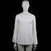 Tunic - White - Size M - White solid top with a round neckline and long sleeves featuring ruffle bands near the cuffs. Straight hem with no visible closures.