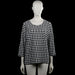Isolde - Long-sleeve top - Black & White - Size L - Black and white chevron-patterned top with a round neckline and three-quarter sleeves. Straight hem and plain cuffs with no visible closures.
