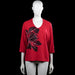 Kappahl - Long-sleeve top - Red & Black - Size 46, 48 - Red top with a V-neck and three-quarter sleeves with plain cuffs. Features a large black floral print on the front and a straight hem.