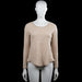 Design - Sweater - Beige - Size M - Beige solid long-sleeve top with a round neck and plain cuffs. Features a curved hem with no visible closures.