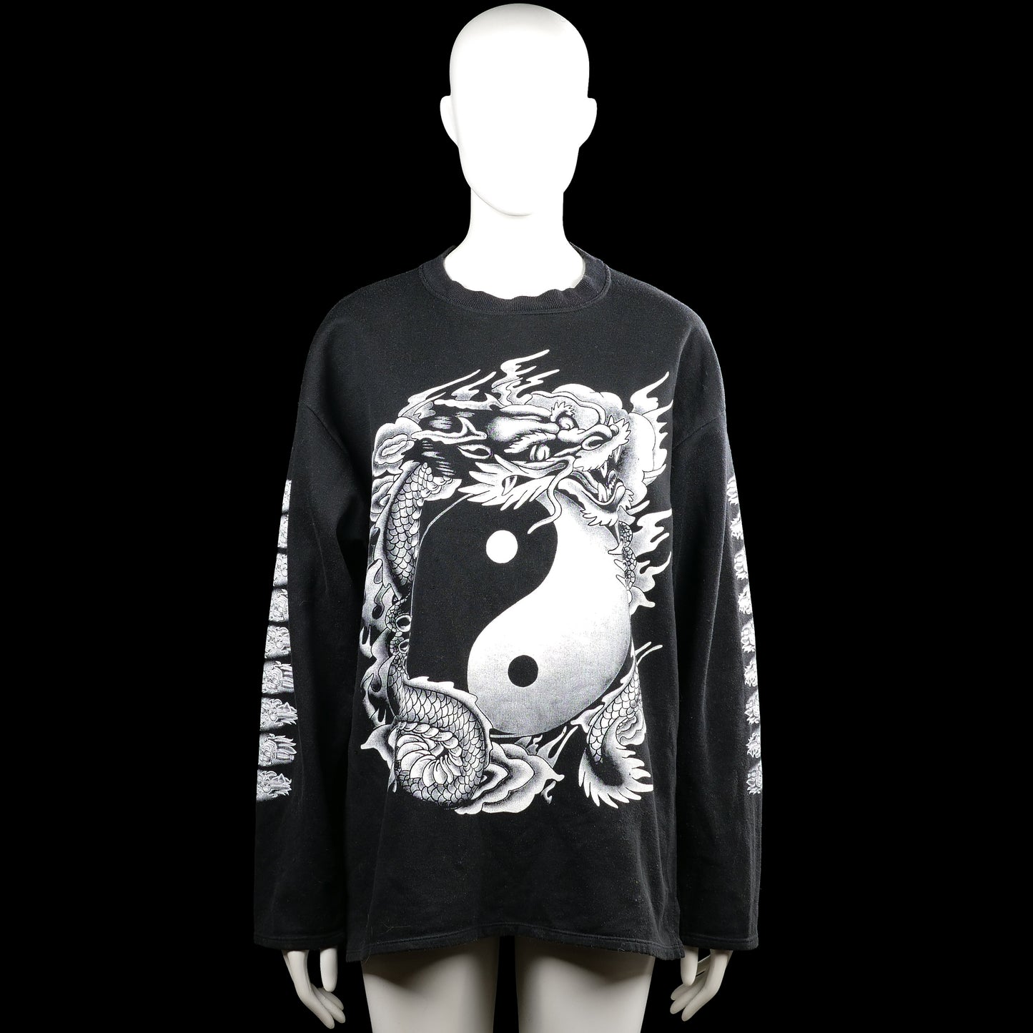 Sweatshirt - Black & White - Size L - Black long-sleeve top with a round neck and straight hem. Features a large white graphic print on the front and back with additional white prints along the sleeves.