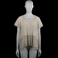 Raselbud - Tunic - Ivory - Size M - Ivory solid short-sleeve top with a scoop neckline and lace trim at the neckline and sleeve hems. Features pintuck pleats on the front and a high-low hem with a lace panel at the bottom.