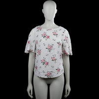 157 angelology - Blouse - White & Pink - Size S - White top with a pink floral pattern and a boat neckline. Features short flared sleeves and a curved hem.