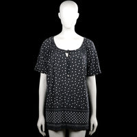 Canda - Tunic - Black & White - Size XL - Black top with a white polka dot pattern and short sleeves. Scoop neckline with a front tie detail and a straight hem.
