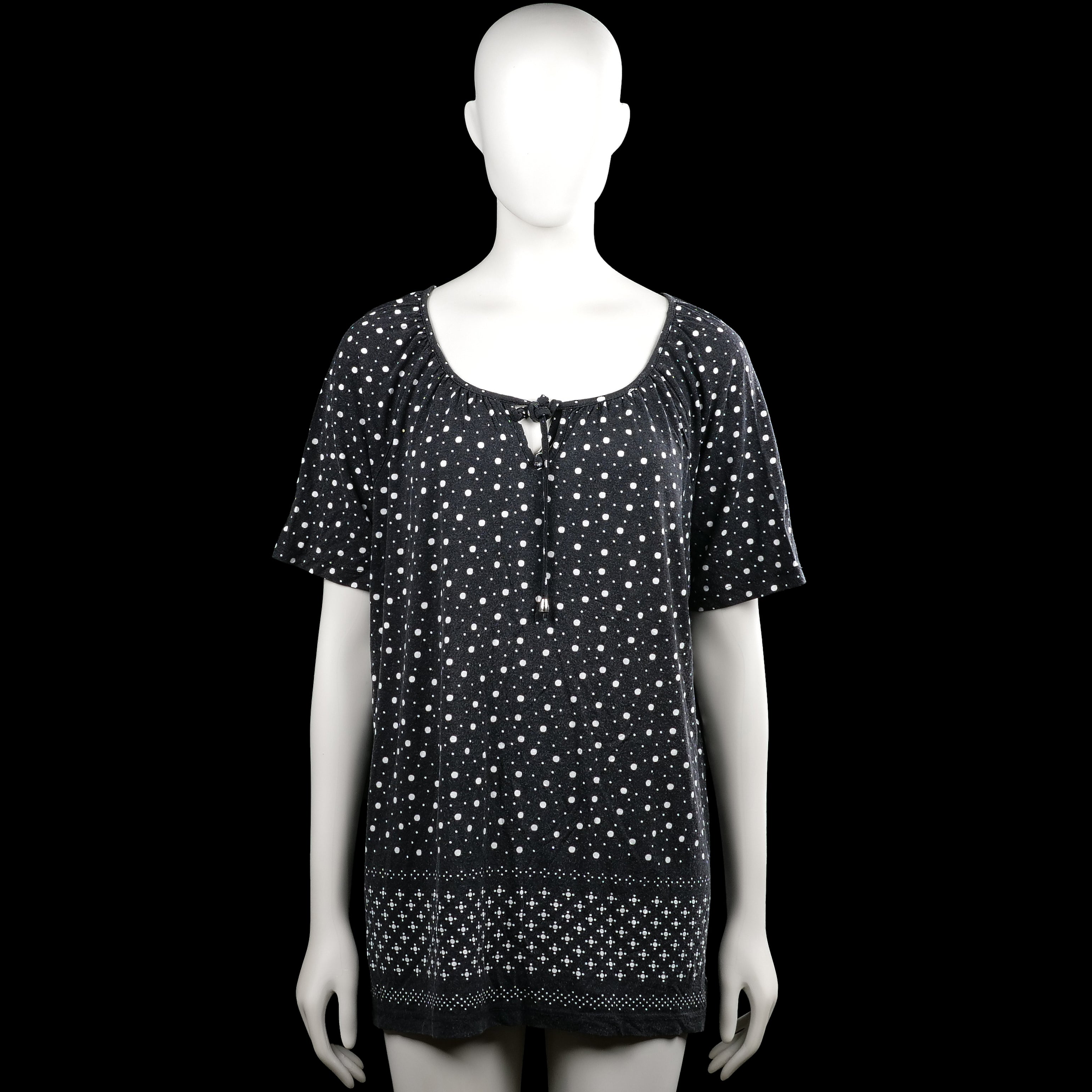 Canda - Tunic - Black & White - Size XL - Black top with a white polka dot pattern and short sleeves. Scoop neckline with a front tie detail and a straight hem.