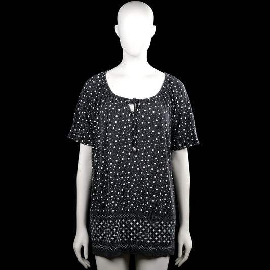 Canda - Tunic - Black & White - Size XL - Black top with a white polka dot pattern and short sleeves. Scoop neckline with a front tie detail and a straight hem.