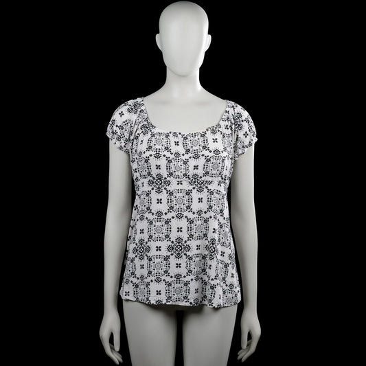 Kappahl - Blouse - White & Black - Size M - White top with a black all-over print and a scoop neckline. Features short puff sleeves with elastic cuffs and a straight hem.