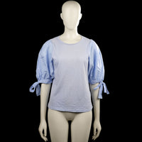 H&M - T-shirt - Light Blue & Denim Blue - Size XS - Two-tone light blue top with a round neck and short puff sleeves finished with tied cuffs. Solid design with a straight hem.