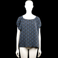Ottodame - Blouse - Black & Royal Blue - Size 38 - Black top with a blue floral pattern and a scoop neckline. Features short sleeves with elastic cuffs and a straight hem.