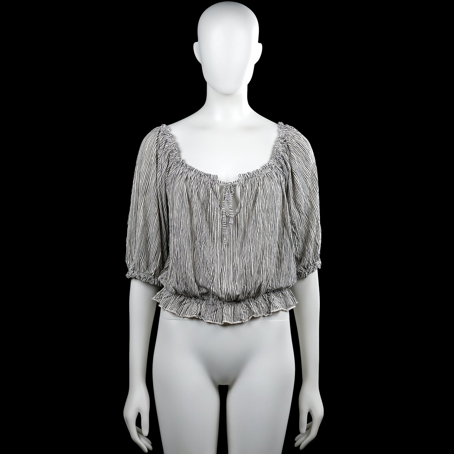 Lindex - Blouse - White & Black - Size M - White top with thin black vertical stripes and a scoop neckline with a front tie opening. Short sleeves with elastic cuffs and an elastic hem with a ruffled edge.