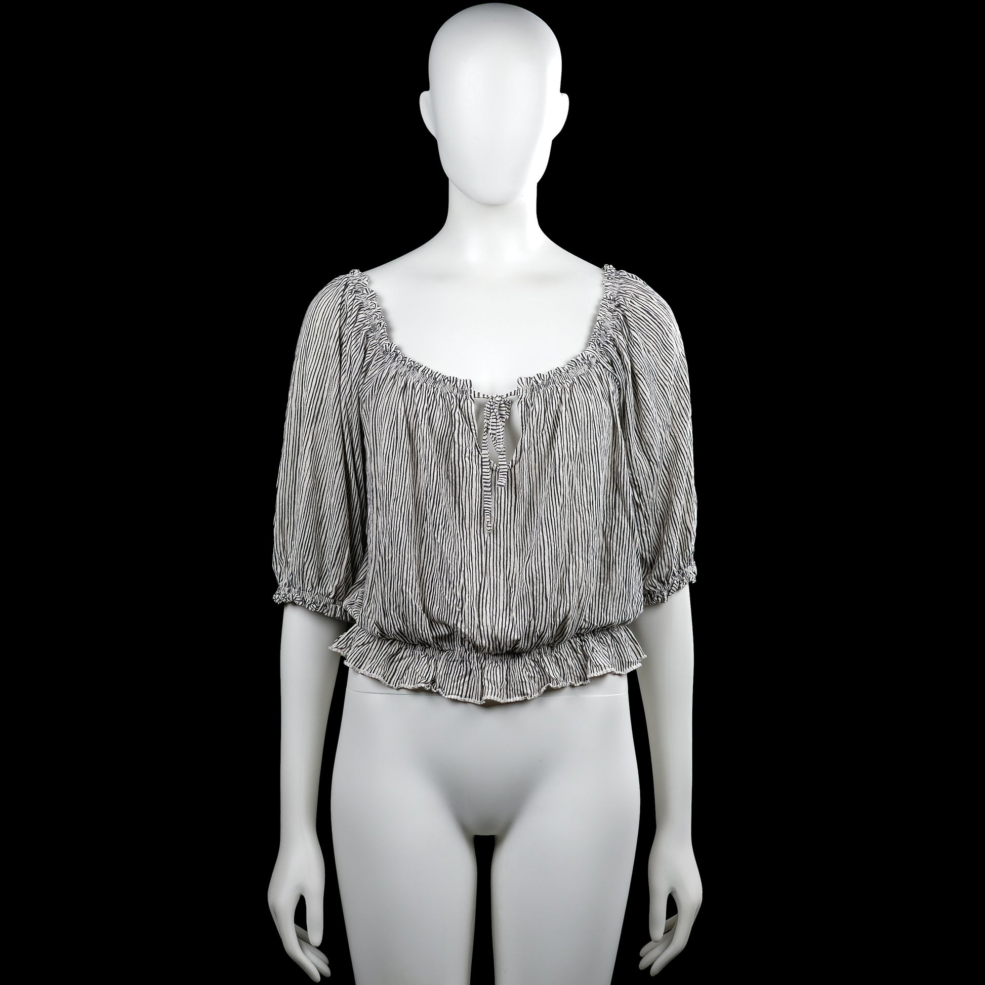 Lindex - Blouse - White & Black - Size M - White top with thin black vertical stripes and a scoop neckline with a front tie opening. Short sleeves with elastic cuffs and an elastic hem with a ruffled edge.