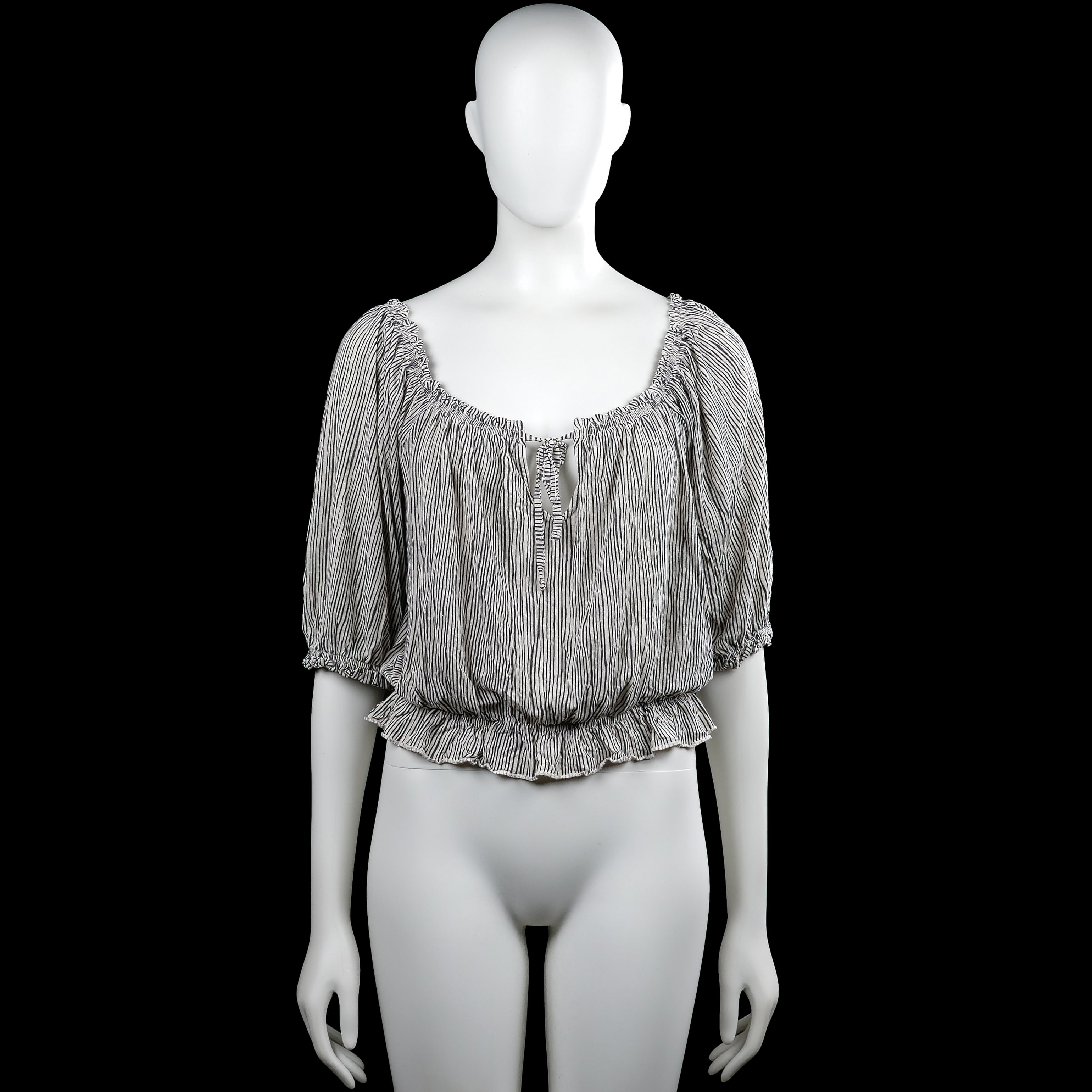 Lindex - Blouse - White & Black - Size M - White top with thin black vertical stripes and a scoop neckline with a front tie opening. Short sleeves with elastic cuffs and an elastic hem with a ruffled edge.