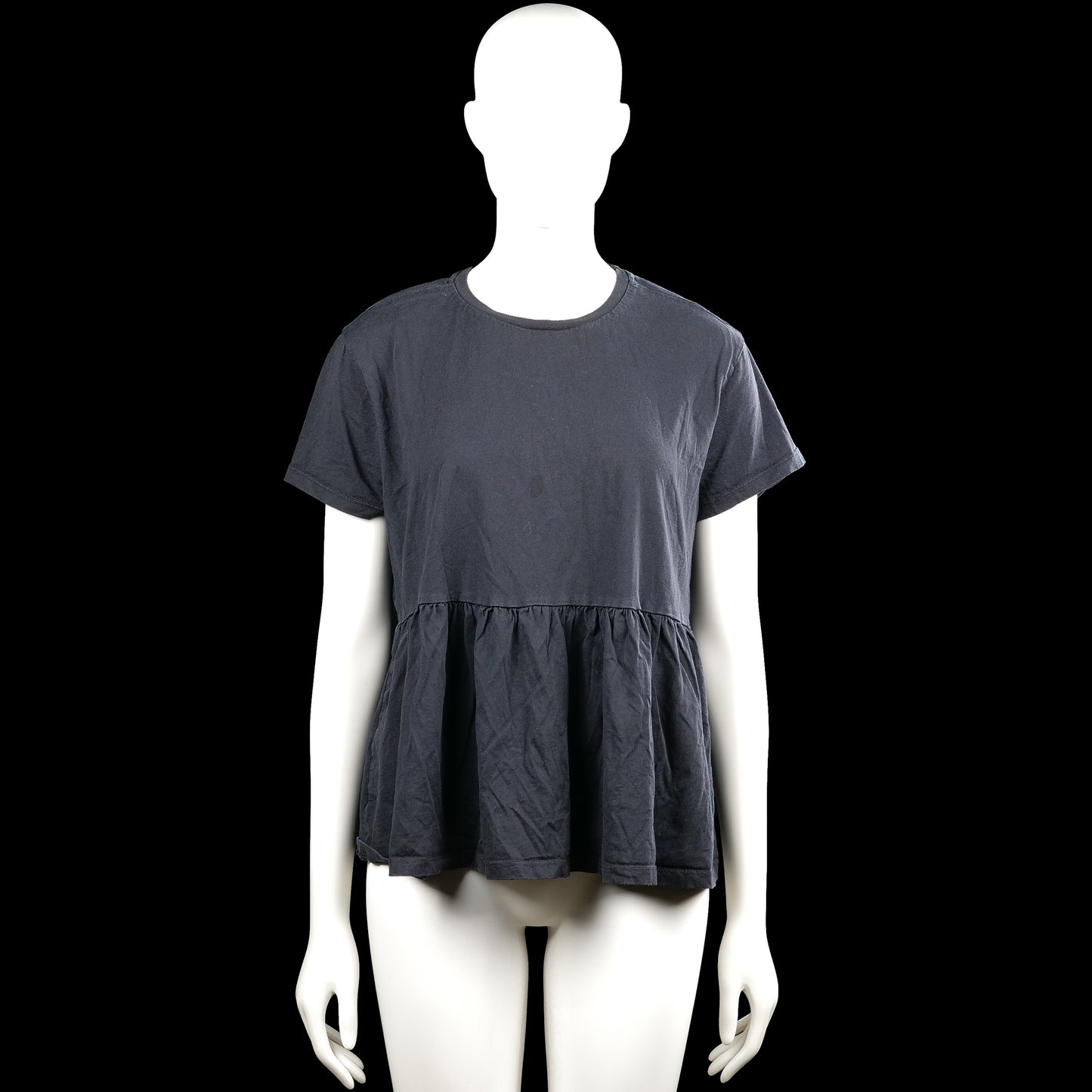 157 - Tunic - Dark Gray - Size M - Dark gray solid top with a round neck and short sleeves. Features a gathered ruffle hem and plain cuffs.
