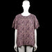 Mywear - Tunic - Purple & Black - Size XXL - Purple and black floral top with a round neckline and short flutter sleeves. Smocked yoke detail across the upper chest and back with a straight hem.