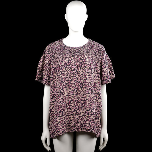 Mywear - Tunic - Purple & Black - Size XXL - Purple and black floral top with a round neckline and short flutter sleeves. Smocked yoke detail across the upper chest and back with a straight hem.